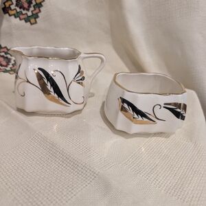 Artistic Gold and Black Feather Ceramic Set